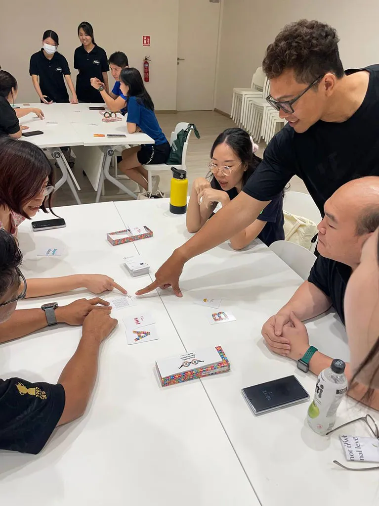 Visitors engaging with gamified CO₂ decision-making game