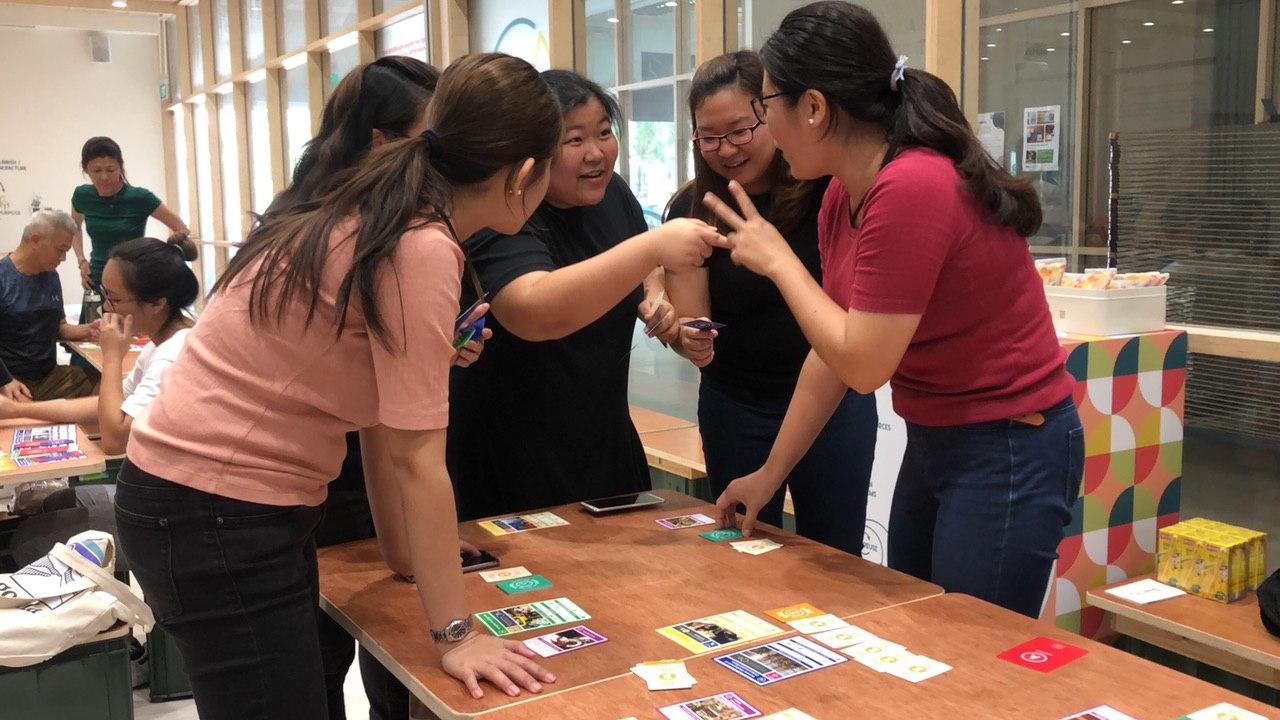 Visitors participating in a hands-on carbon learning activity
