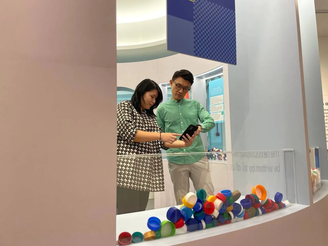 Guests learning from interactive carbon displays during their visit