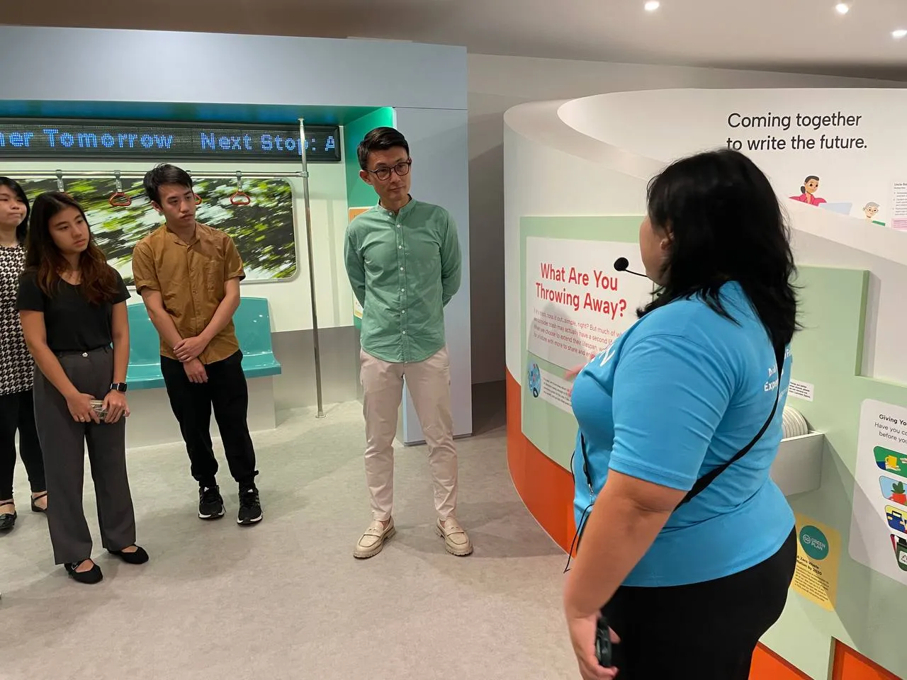 Guests learning from interactive carbon displays during their visit at Carbon Gallery