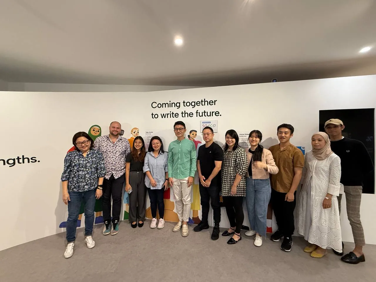 Tour Grpup participating in a hands-on carbon learning activity at Carbon Gallery